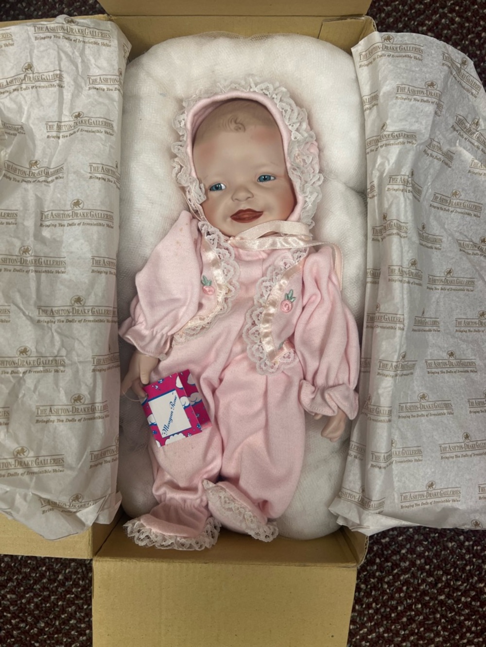 Ashton-Drake Porcelain Baby Doll “Megan Rose” in Pink Lace Outfit
